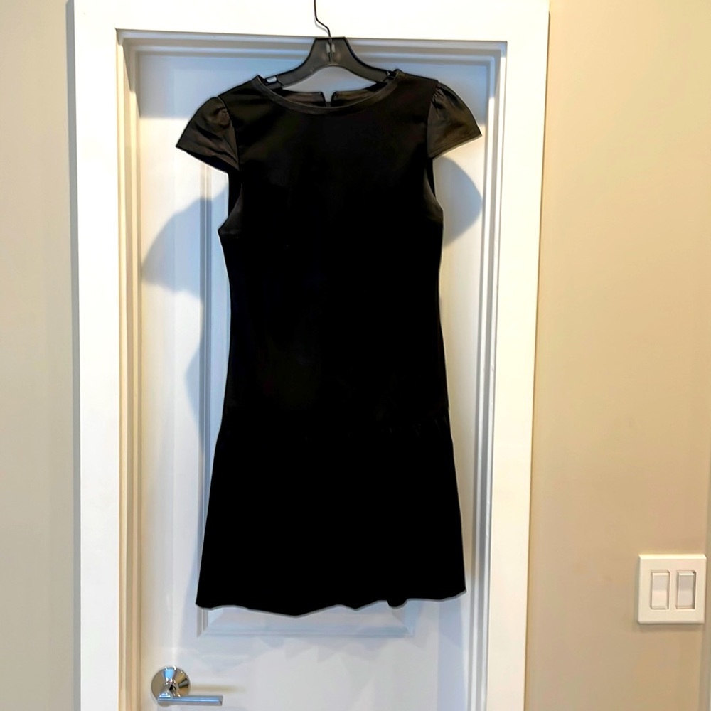 Alice and Olivia Size 4 black dropped waist mini dress with “leather” trim